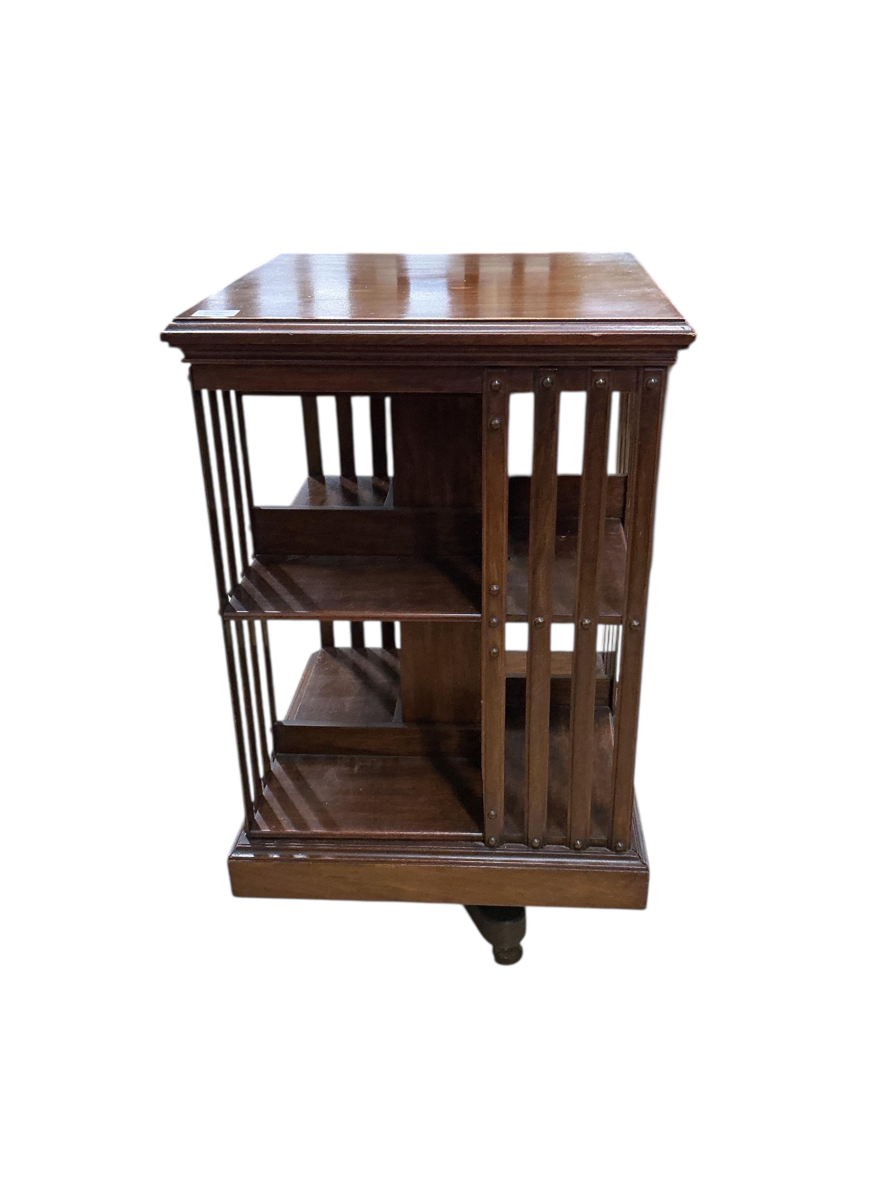 An early 20th century mahogany revolving bookcase, width 49cm, depth 49cm, height 86cm